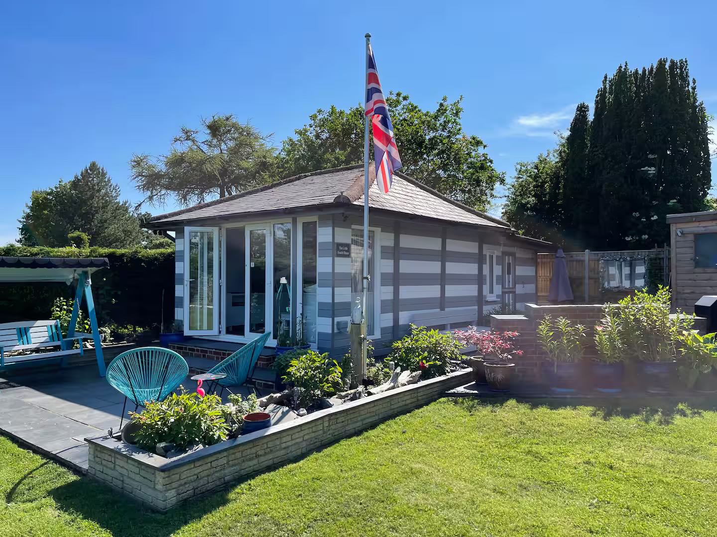 Beach House Exterior with Garden Patio